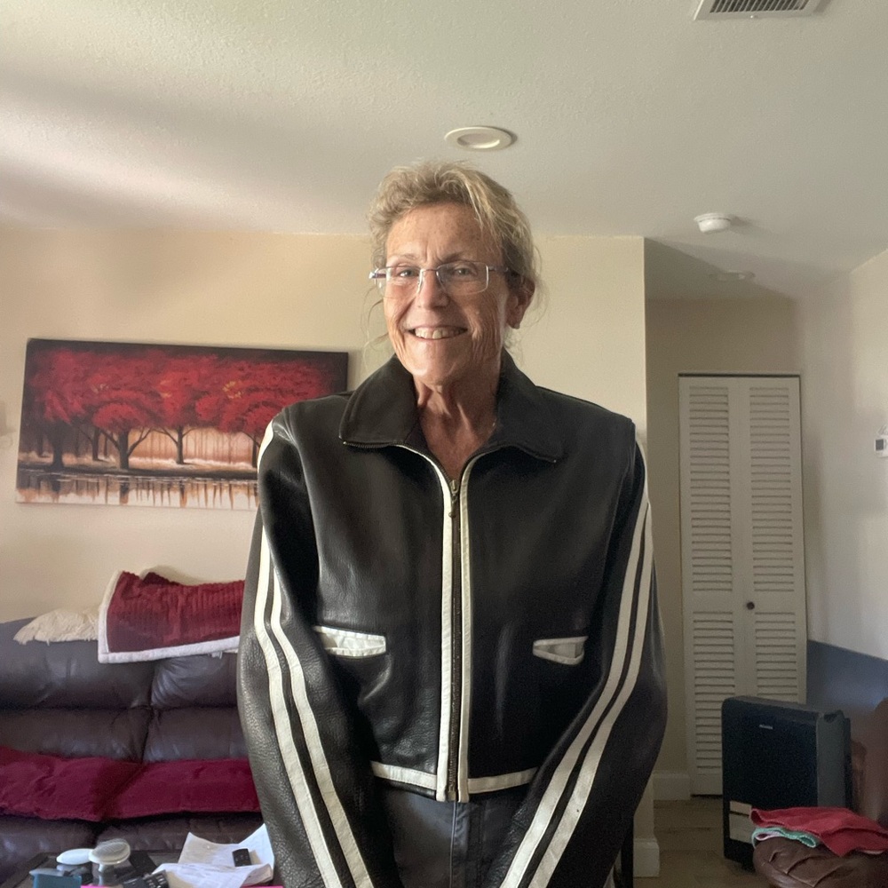Chic Black Leather Jacket with White Stripes